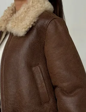 Короткая дубленка - женская - фото 1